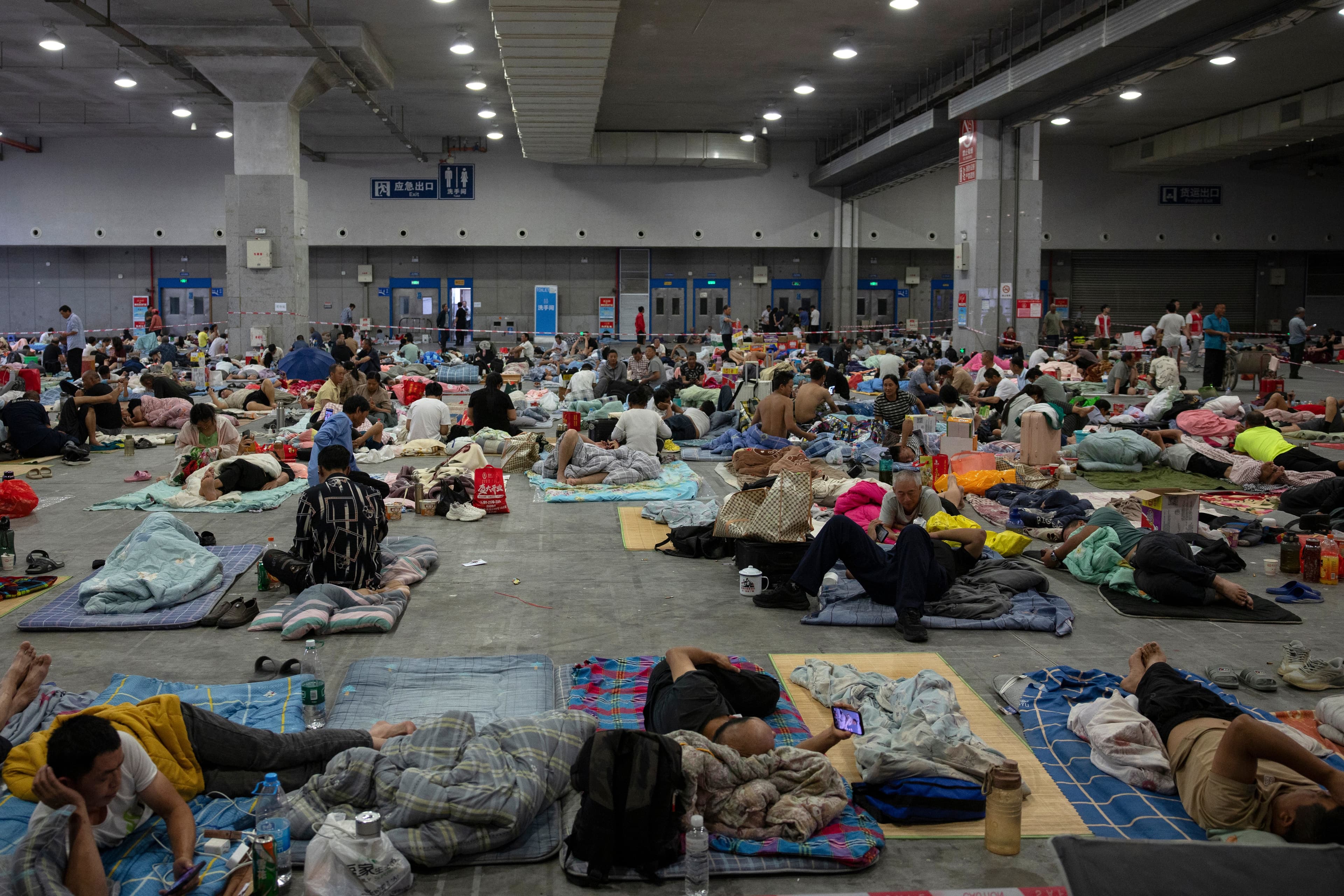 Shared beds, shrinking budgets: China’s young workers feel economic squeeze