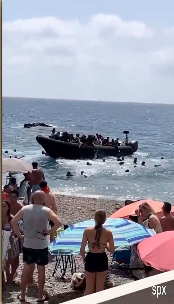 Migrants storm beach packed with tourists near Spain’s La Manga resort