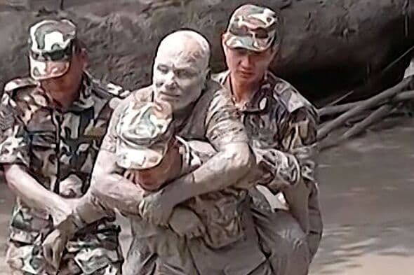 Incredible moment soldiers rescue survivors of Nepal flash floods as hundreds missing