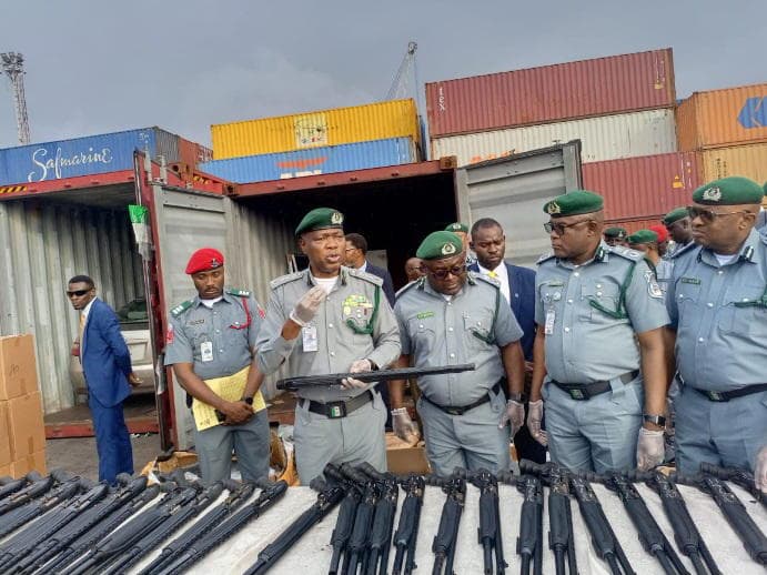Customs intercepts pump-action rifles at Tin Can Port, suspect on the run