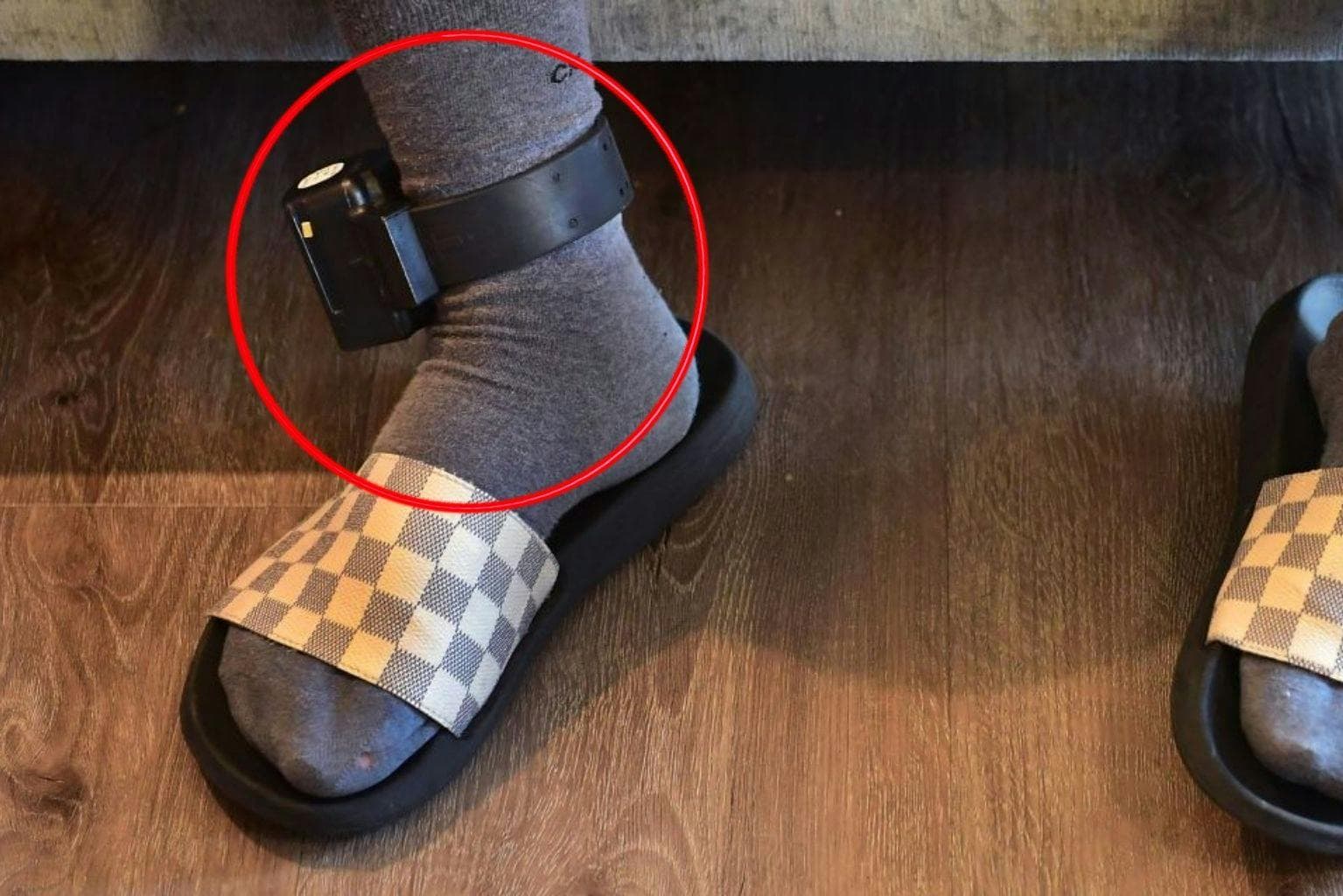 Haitian immigrant in tears after receiving ankle monitor