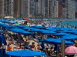 Spain's summer squeeze as British holidaymakers reveal beaches so packed they're warning others away