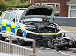 Three boys are rushed to hospital after stolen moped and police car crash