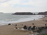 Teenage boy is swept out to sea off Welsh beach as Coastguard launch search
