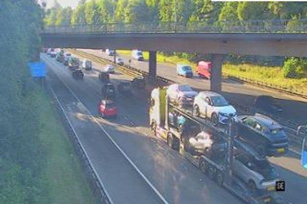 Double crash on M8 leaves cars on roofs as drivers face rush-hour chaos