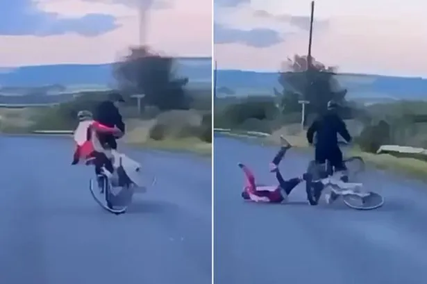Shocking footage shows thug knock cyclist of bike in front of oncoming traffic