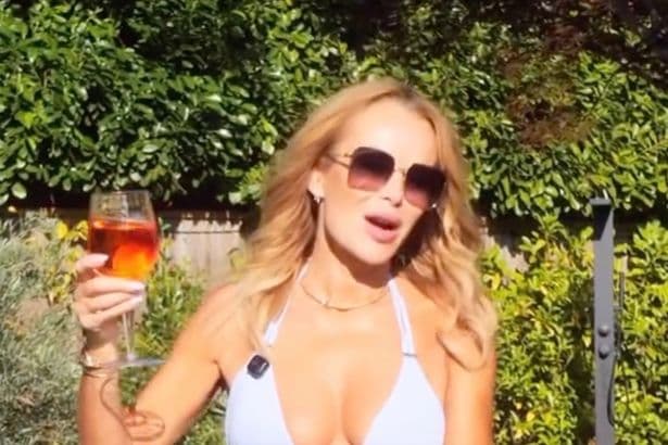 Amanda Holden, 55, strips to skimpy blue bikini on inflatable sunbed for sizzling shoot