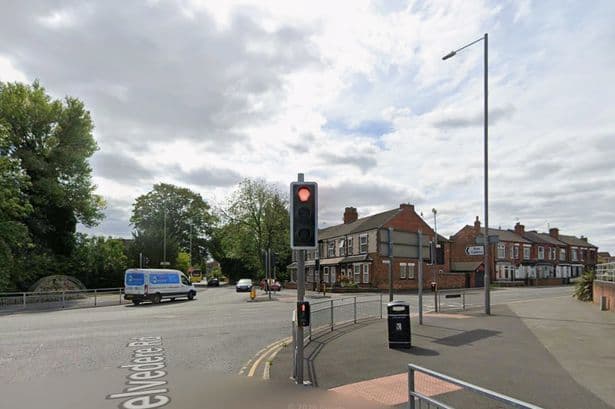 Major road closed and drivers told to avoid area as man and woman injured