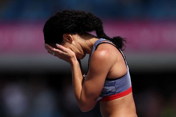 Katarina Johnson-Thompson comforted by Keely Hodgkinson after difficult scenes