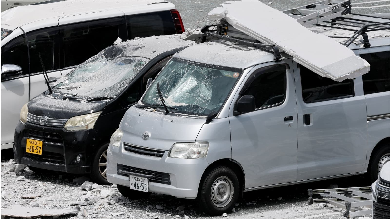 Death toll rises to 18 as rescuers comb through quake rubble in southwestern Japan
