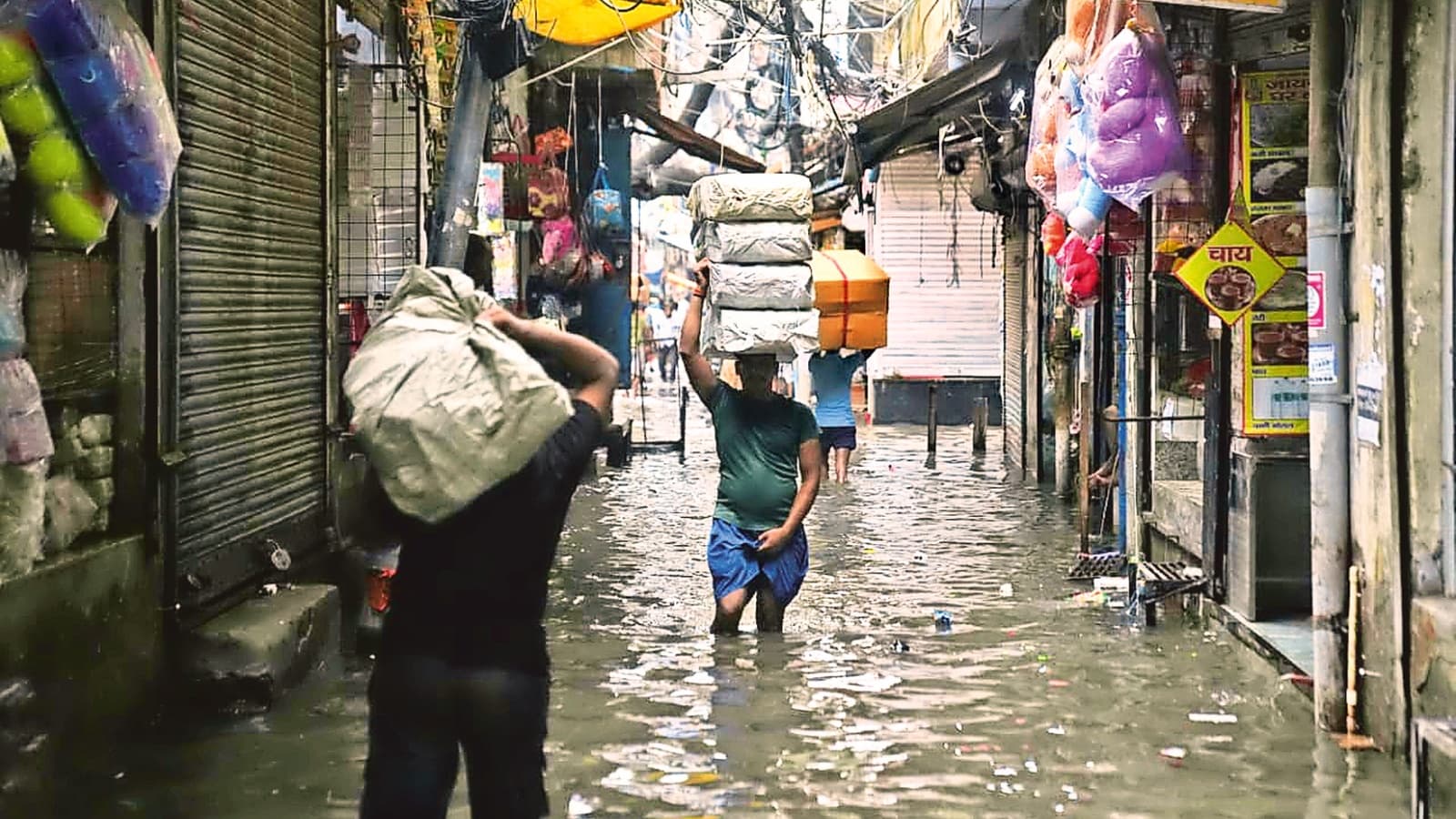 In Delhi’s wholesale hub Sadar, choked drains and water inside shops