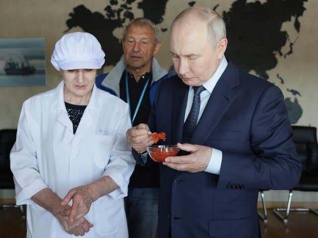 Putin's first trip to the Pacific island chain claimed by Japan draws a protest from Tokyo