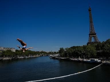High divers take the plunge in the Seine in a new test of Paris’ reclaimed river