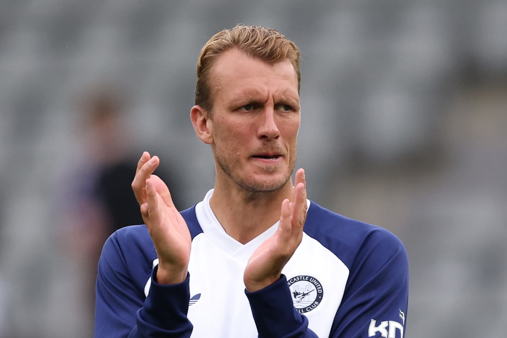 Newcastle captain Dan Burn expected to miss start of season with ankle injury