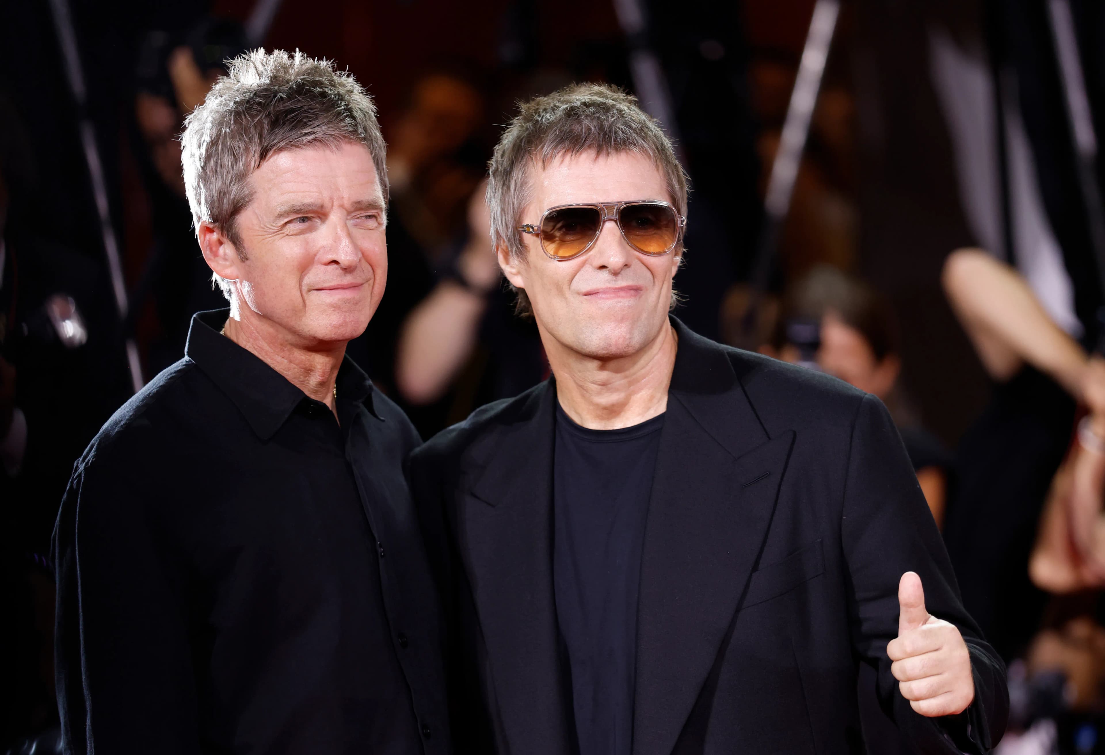 Liam and Noel Gallagher Lock Arms at Venice Premiere of ‘Oasis: Don’t Look Back in Anger’