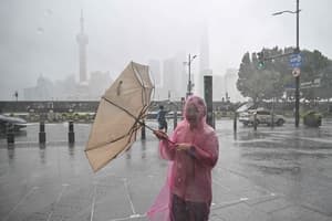 Typhoon Dolphin weakens but disrupts travel in east China