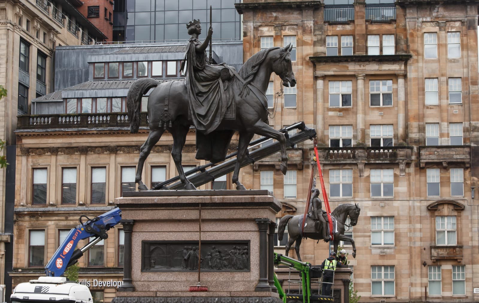 Famous statues return to plinths in George Square after months of restoration