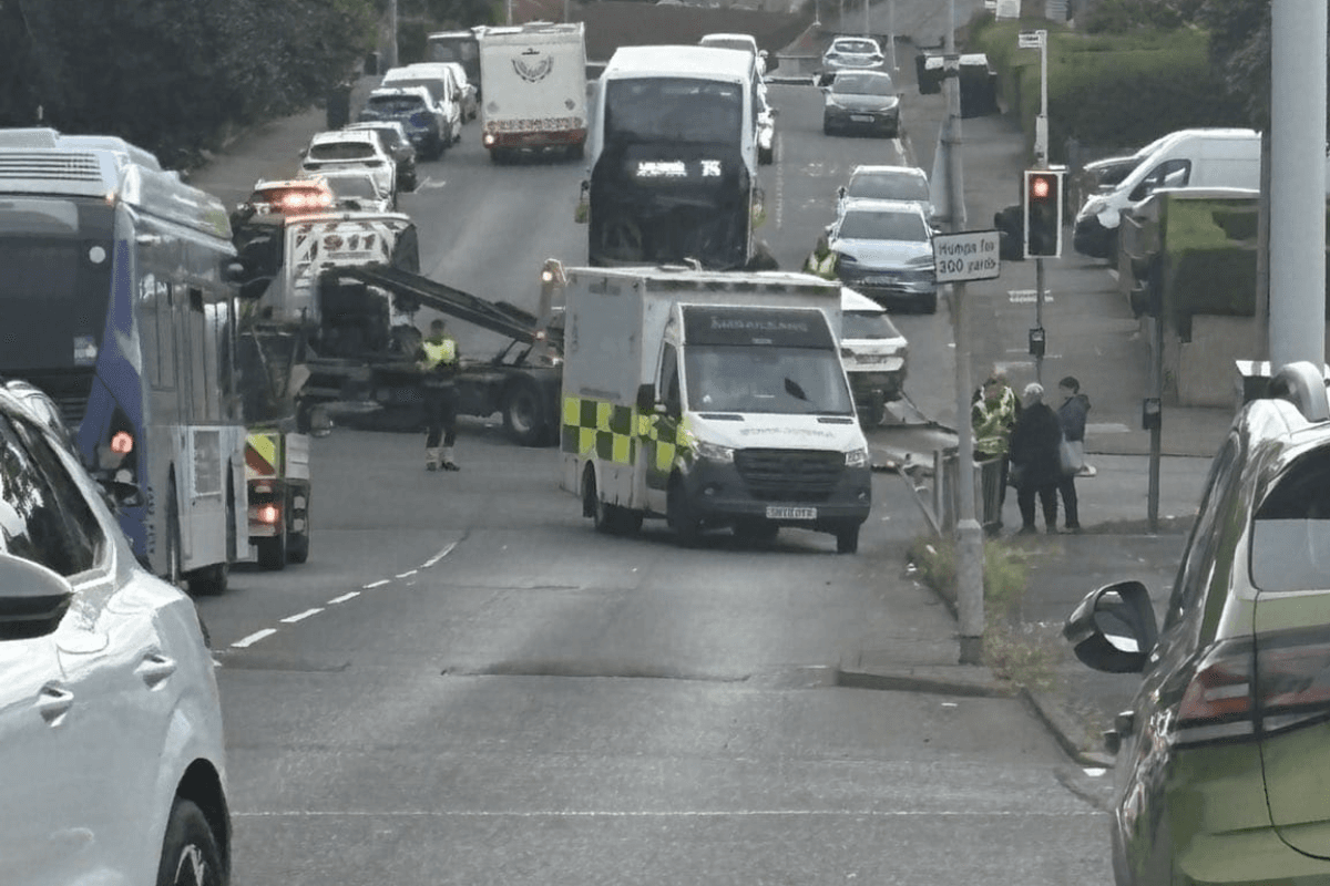 Crash closes Glasgow road in both directions as emergency services divert traffic