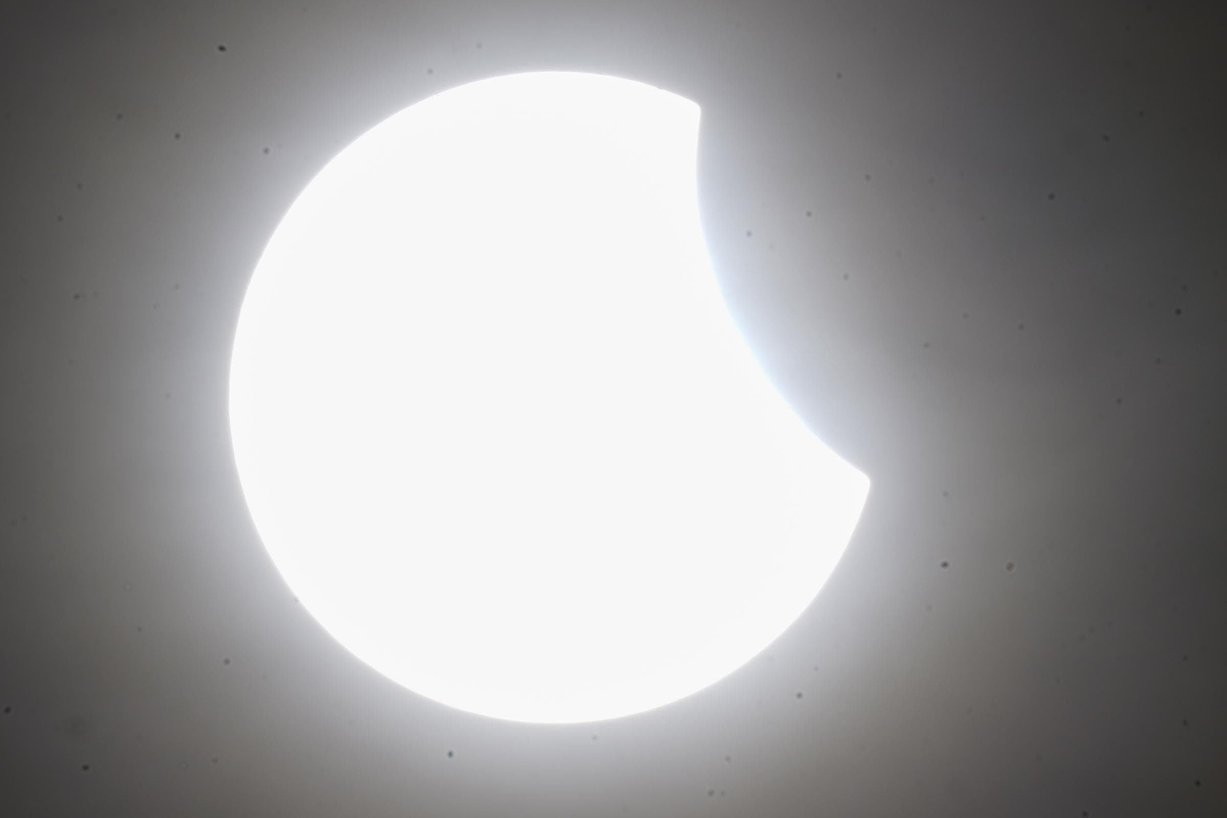Scots to gather for partial eclipse but forecasters warn of clouds for many