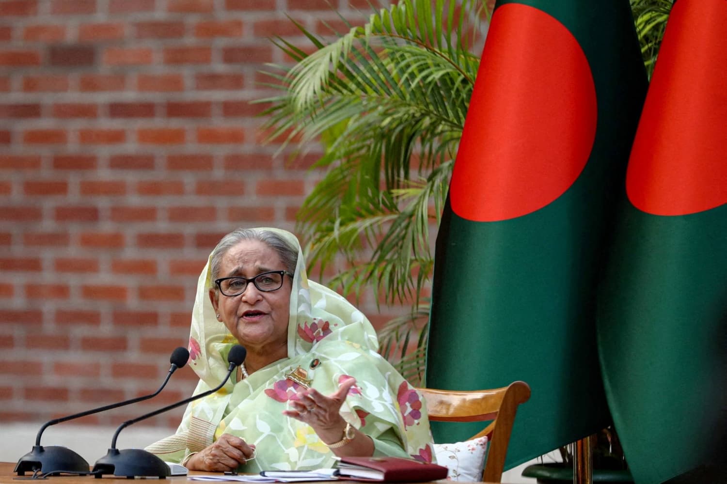 Exiled Bangladesh leader says she’ll return despite threats