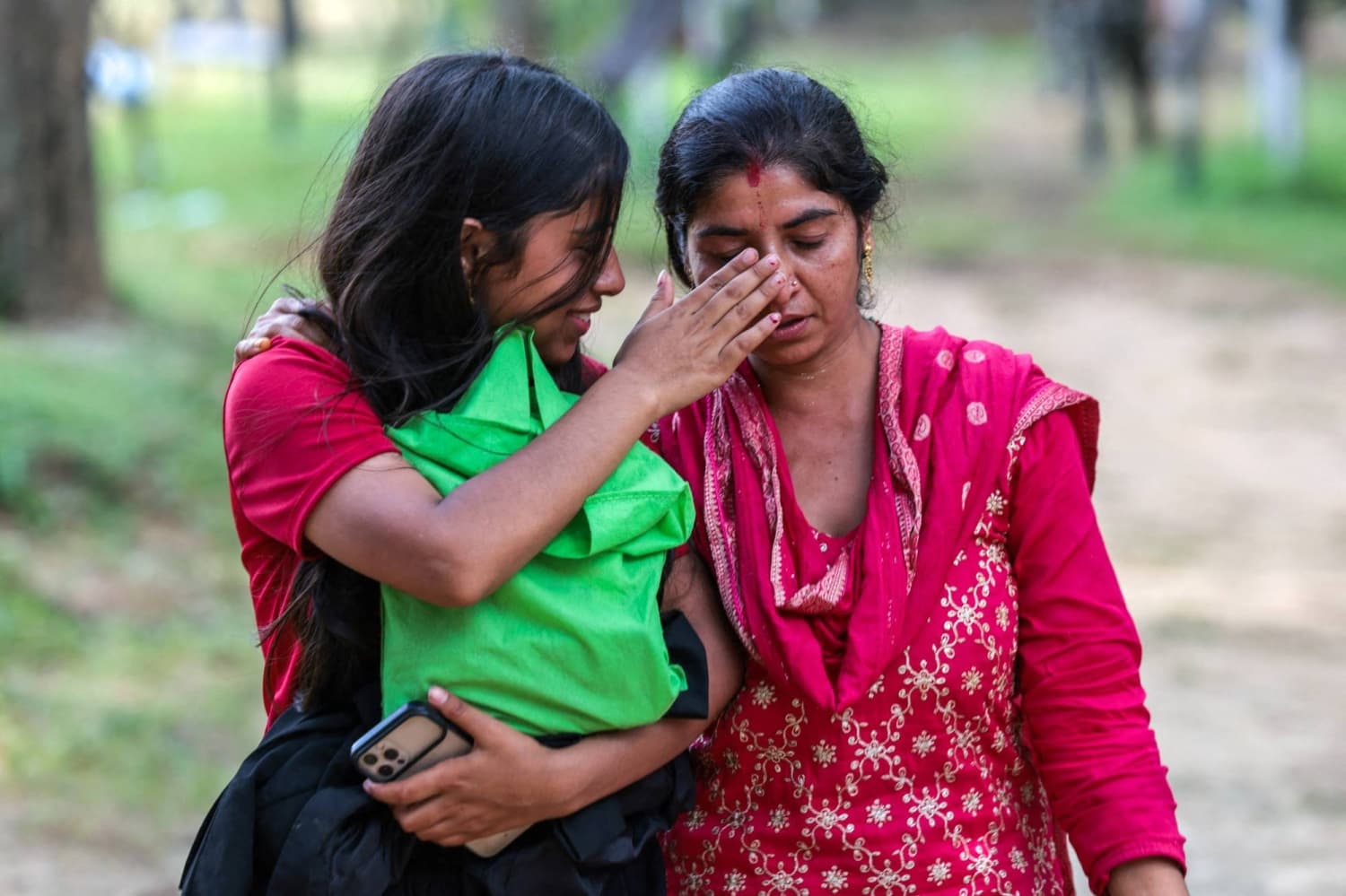 Rescuers dig into tunnel as missing toll from Nepal and China flood nears 3,000