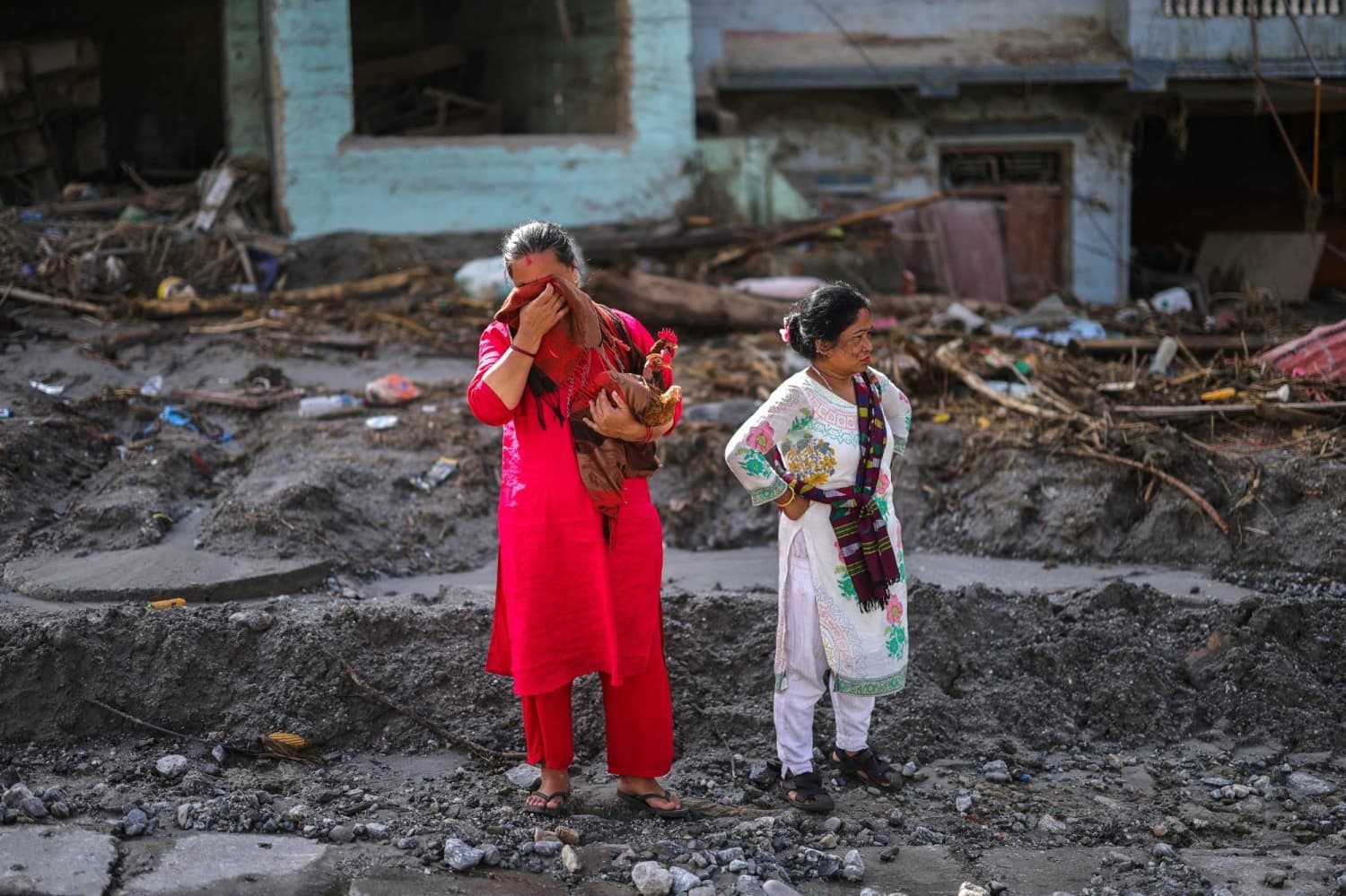 Rescuers dig into tunnel as missing toll from Nepal and China flood tops 3,000