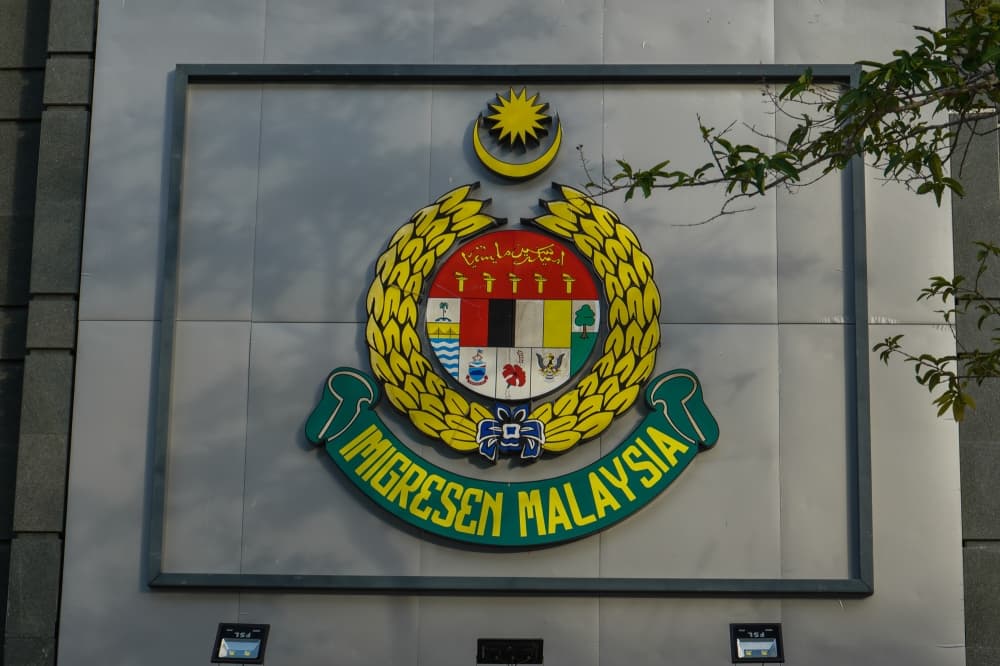 Immigration busts ‘flying passport’ syndicate, three arrested in Johor