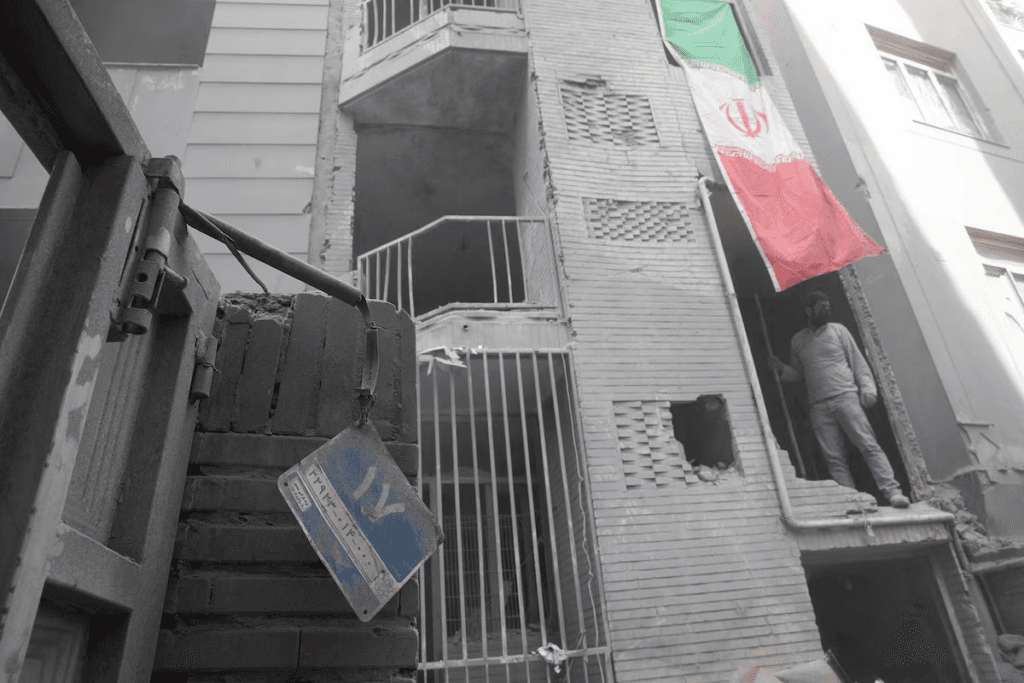 Iranian photojournalist faces 15 years in prison over images, reporting