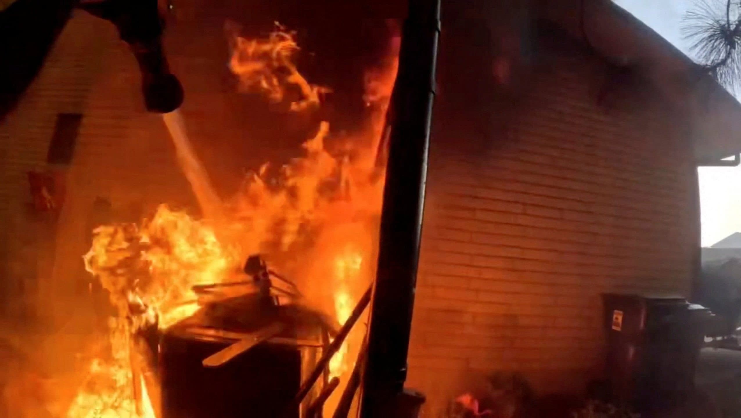Arson suspect in court as wildfires rage around Spokane, Washington