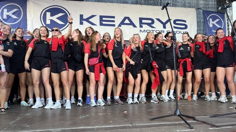 Thousands welcome home Cork camogie champions