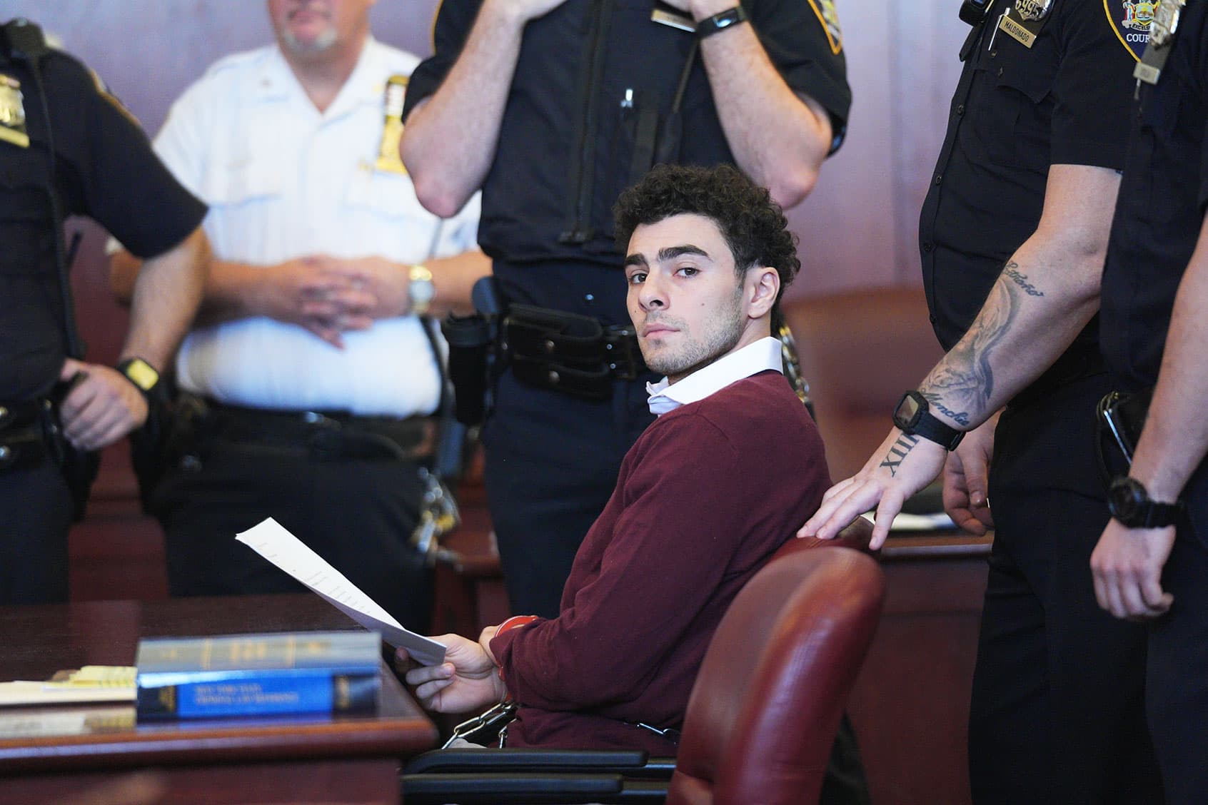 Luigi Mangione pleads guilty to killing health insurance CEO Brian Thompson