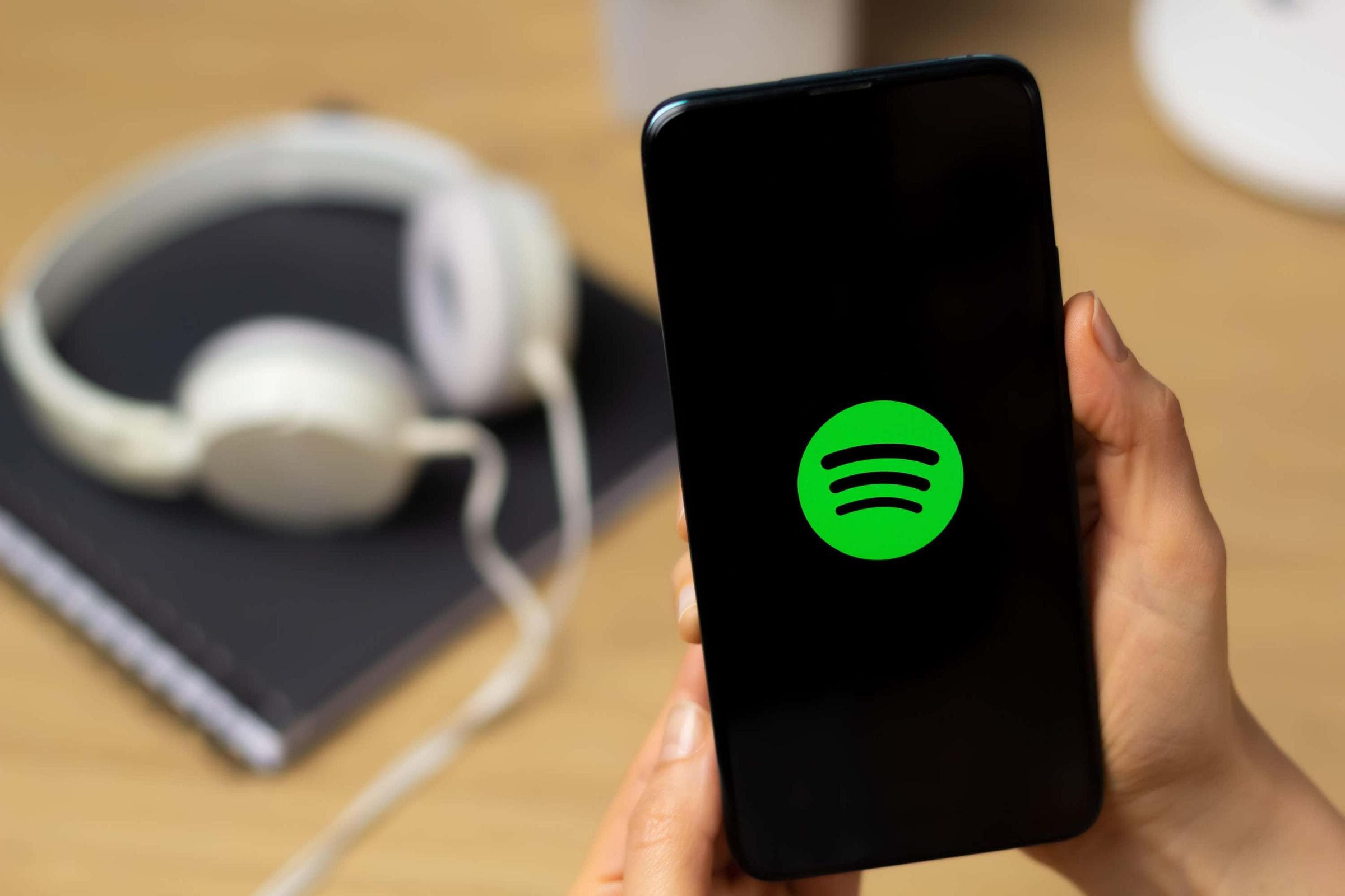 Spotify to label AI-generated artists and remove them from curated playlists