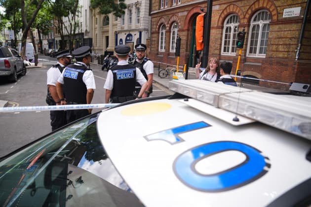 Woman arrested after four men stabbed in central London