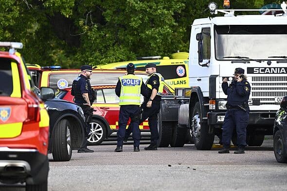 One dead and two seriously injured in sword attack at Sweden school as teen arrested