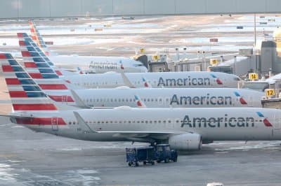 Laptop catches fire on flight, 1 person burned