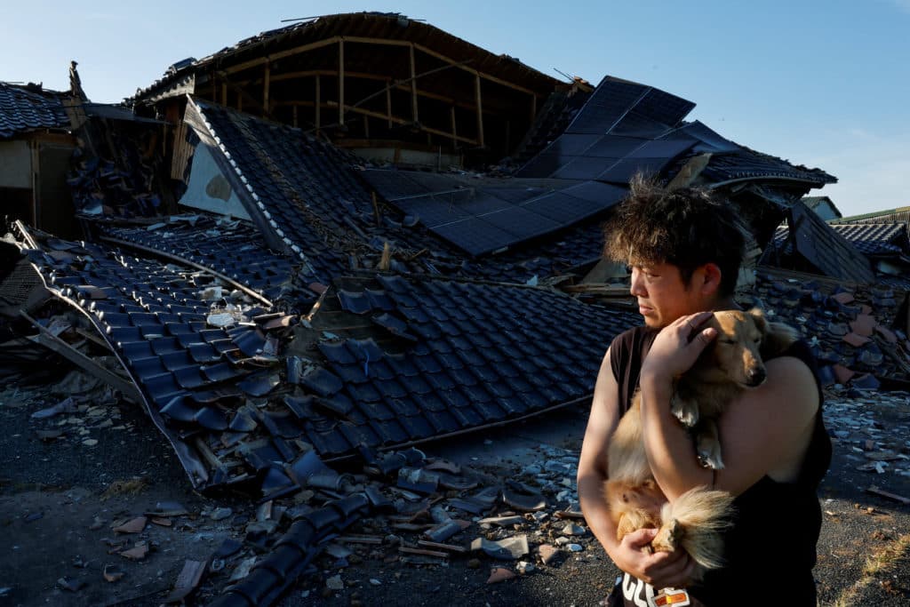 Quake survivors in southwestern Japan sleep in cars in sweltering heat as death toll rises to 34