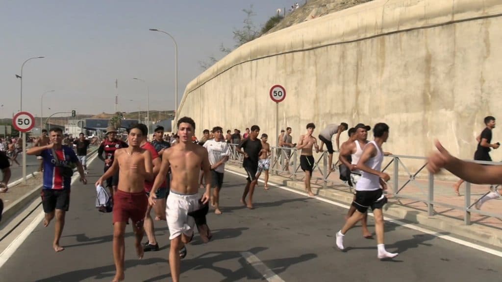 Tens of thousands of migrants enter Spanish territory, then return to Morocco