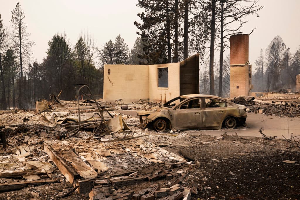 Wildfires near Spokane destroy more than 700 buildings, force 64,000 to flee