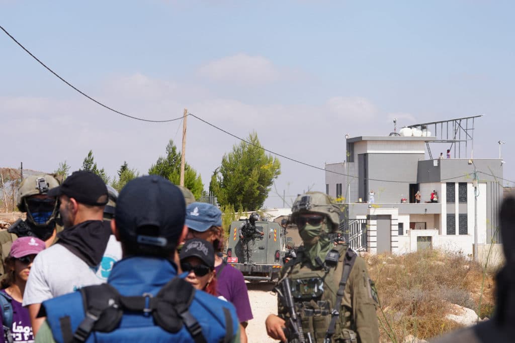 Israeli soldiers accused of supporting ‘terrorist’ settlers in Qusra