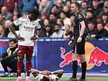 Arsenal and England suffer major injury scare as Gunners star is forced off against West Ham after collision