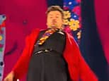 Harry Styles slides and falls on his back in front of 70,000 people in Mexico