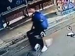 Moment 'Afghan small-boat migrant drags suitcase with British woman's body inside down Athens street'