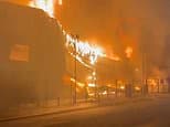 Moment huge blaze rips through fashion outlet which makes suits for Premier League footballers