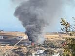 British newlyweds 'on their honeymoon' are killed alongside pilot in Greek island helicopter crash