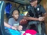 Incredible moment two young girls are rescued from sweltering trailer after being abducted by babysitter