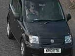 Body 'of missing woman' is found almost a month after she vanished - in crashed car hidden down embankment