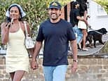 Simone Ashley looks loved-up with her new boyfriend Jay Jammal as they enjoy a dog walk in Notting Hill