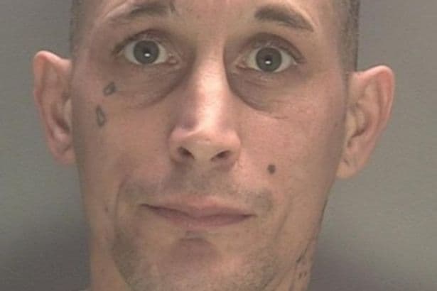 Tattooed face of Perry Barr thug who smashed pint glass over woman's head in violent street robbery