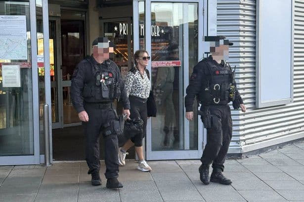 'Black Widow' Pamela Gwinnett lands at Manchester Airport after Tenerife arrest