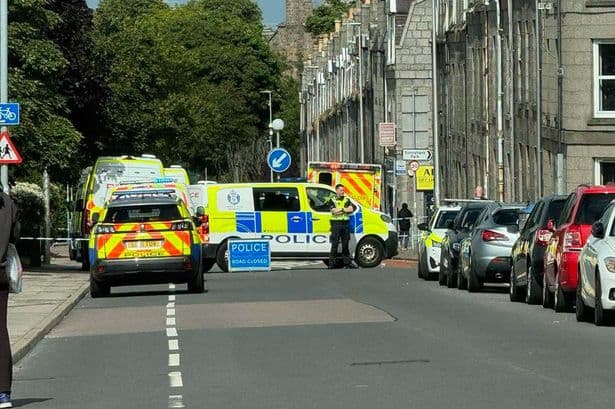 Man rushed to hospital after being found injured in Aberdeen as cops lock down road